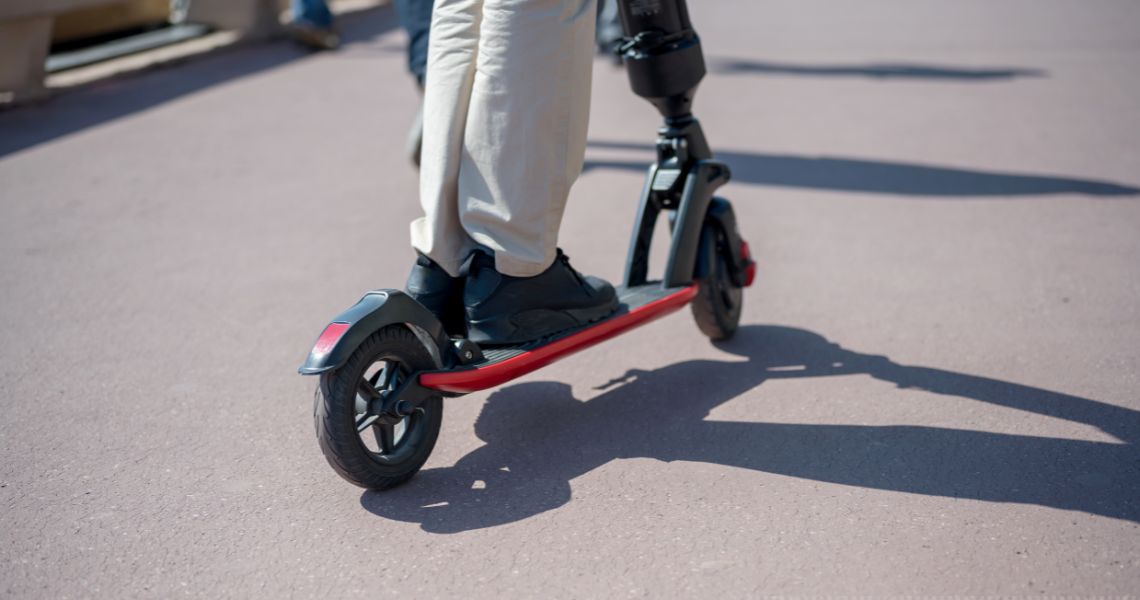 A person riding an escooter